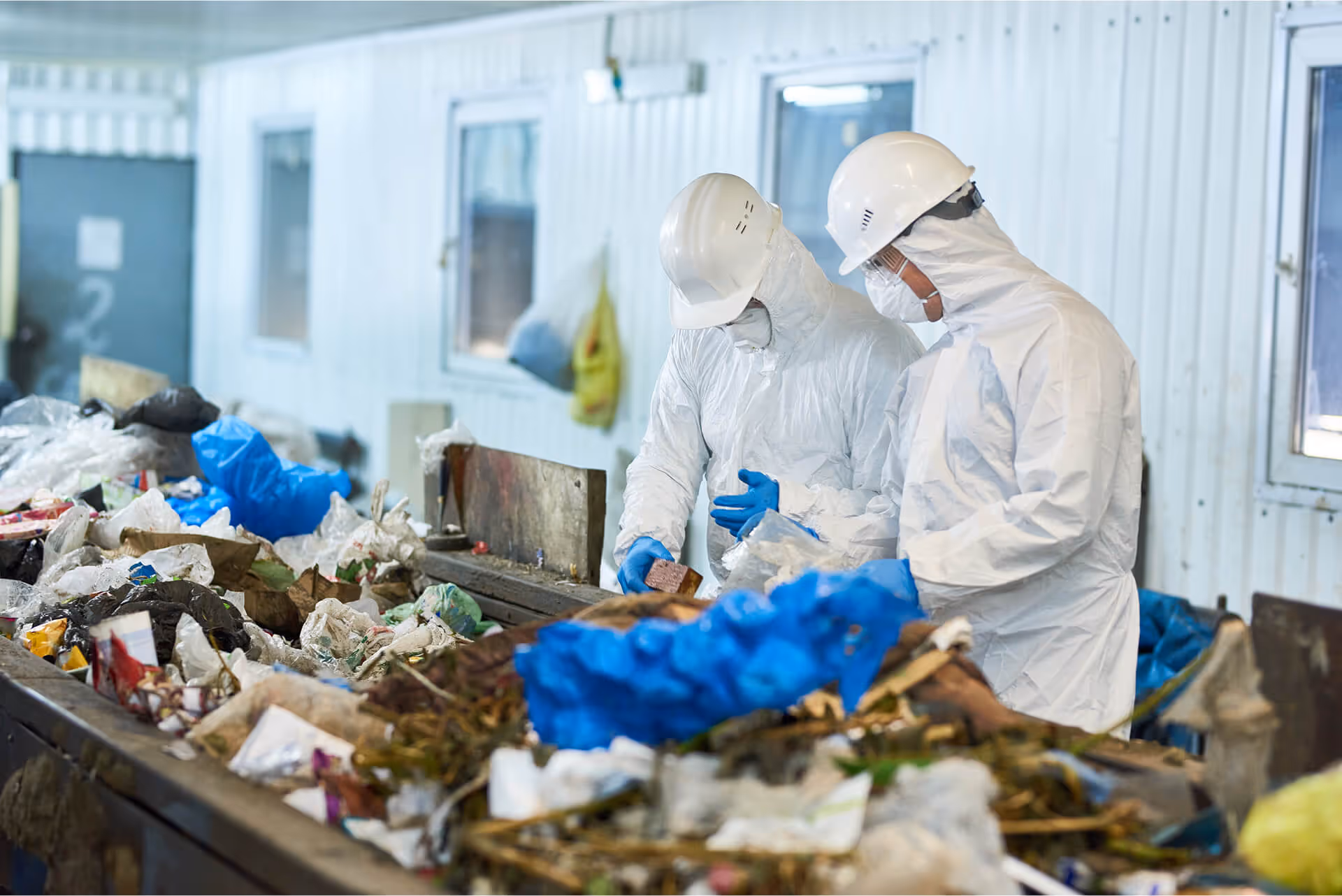 trash sorting on waste processing plan