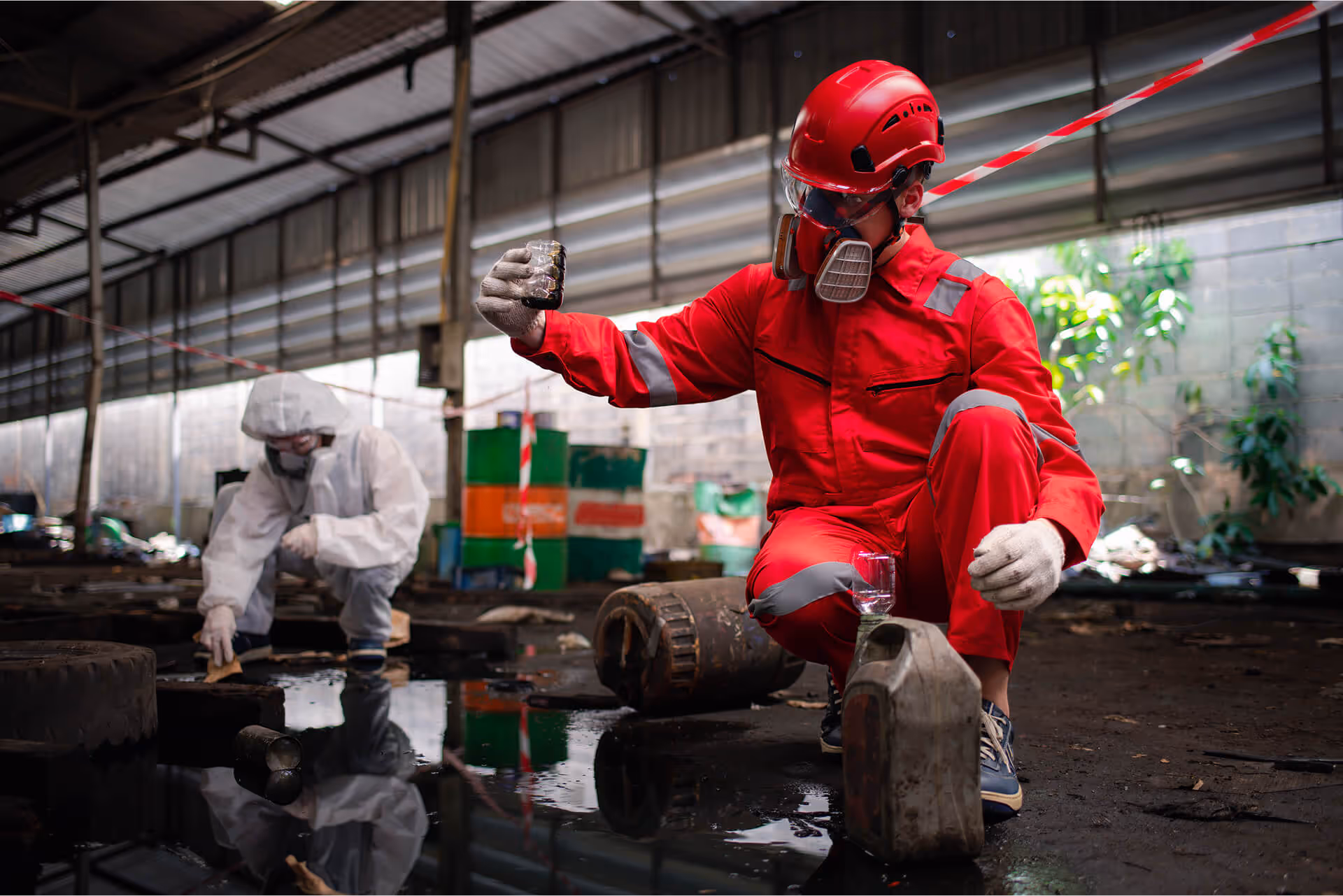 worker wearing safety uniform and gas mask