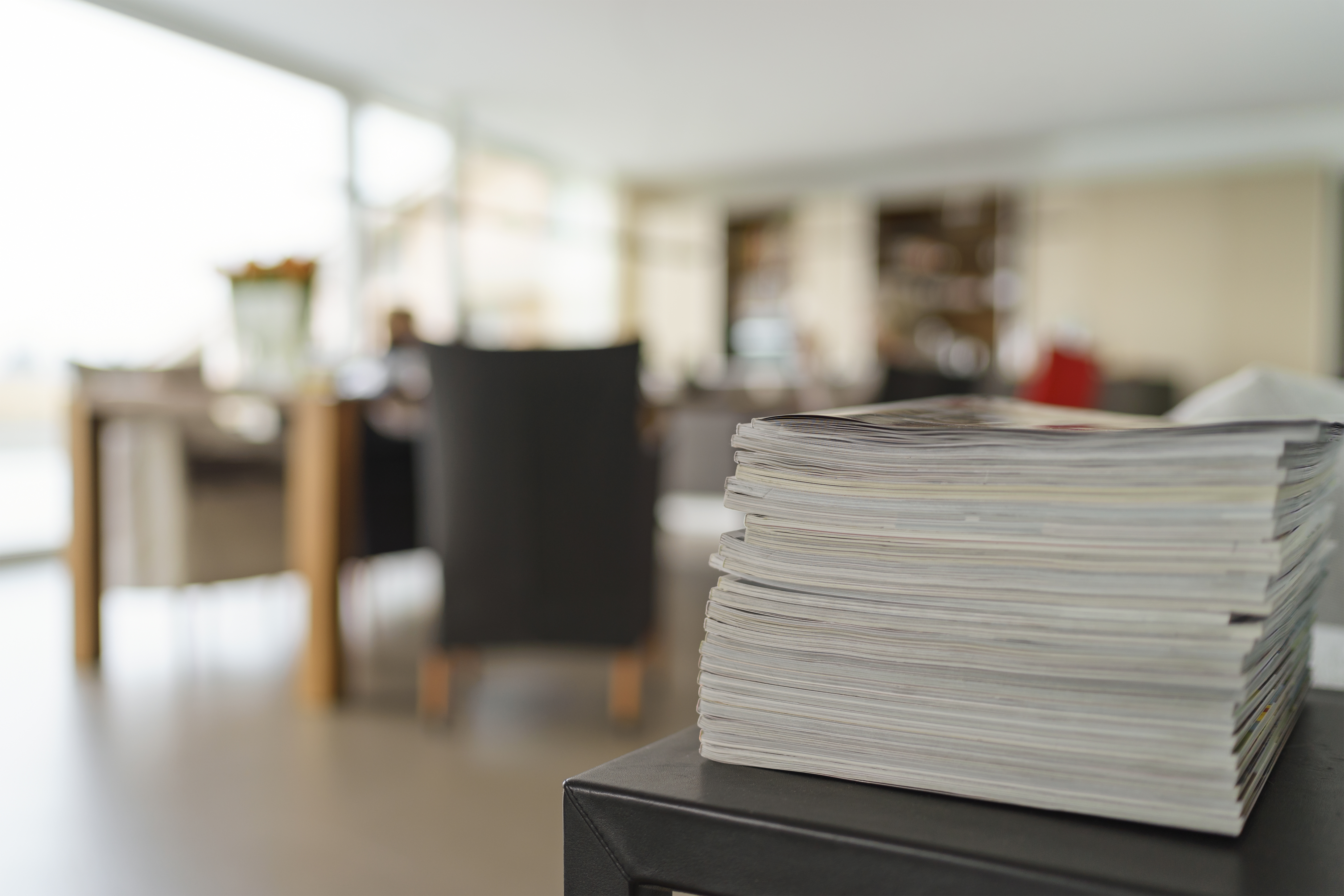 stack of magazines on the table